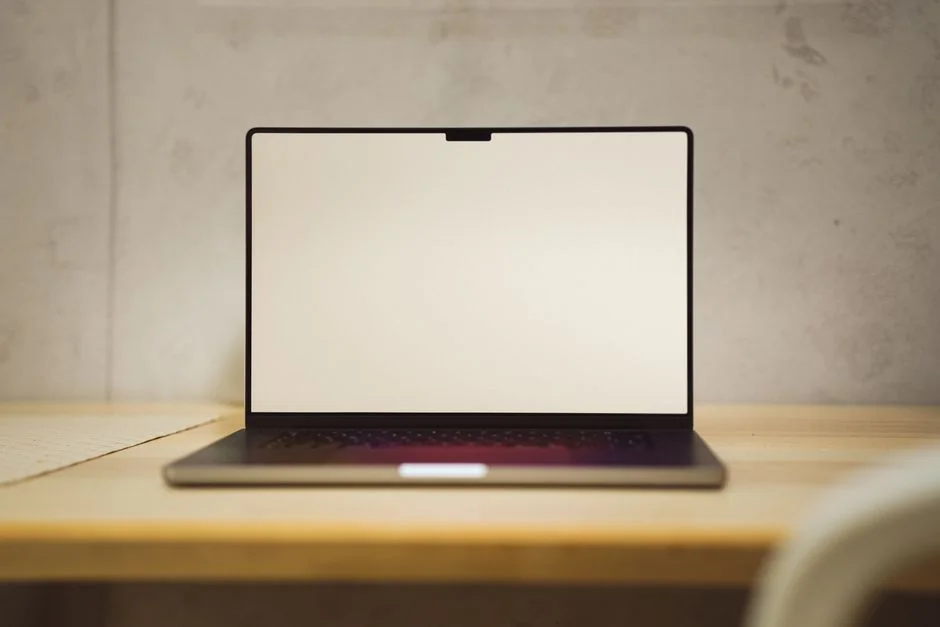 who-we-are Two people using a laptop for online shopping, highlighting modern e-commerce trends.